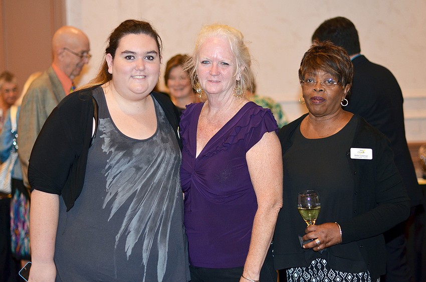 Silent Auction Co-Chairs Kelsey and Kathy Van Praag and Aida Coleman