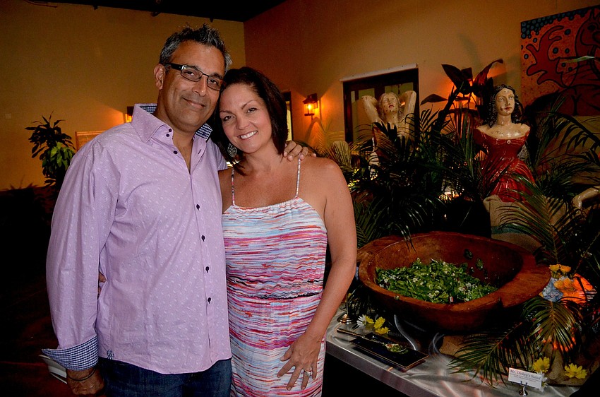 Jag and Amy Grewal find the main attraction of the night — the food table.