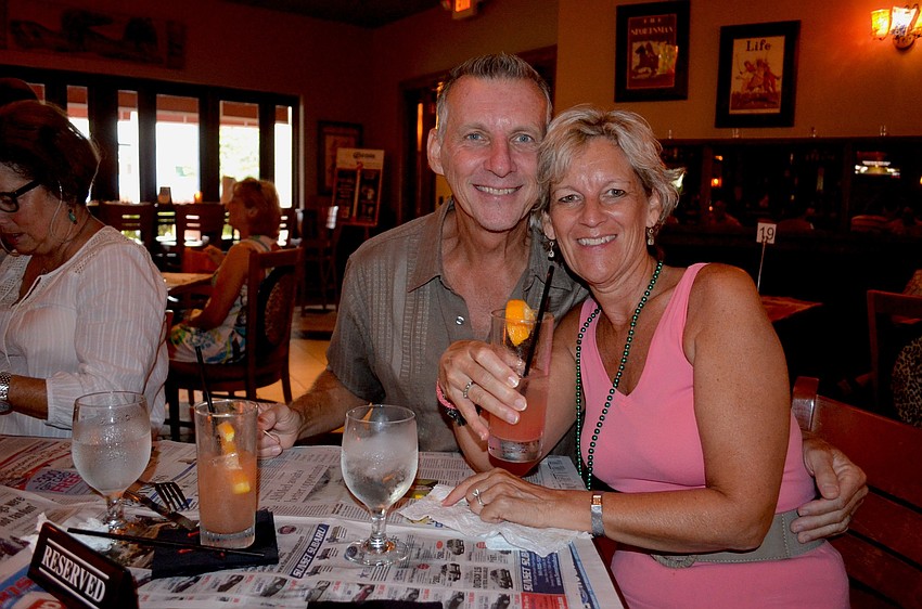 Ralph and Margaret Clarke enjoy their cocktails before a Cajun-inspired dinner.