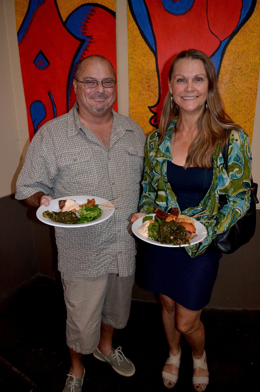Brian Liberman and Elizabeth Pickett Gray enjoy the range of food offered.