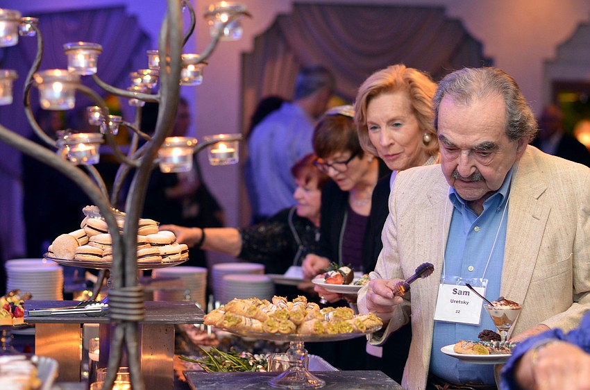Guests form a line at the decadent dessert buffet.