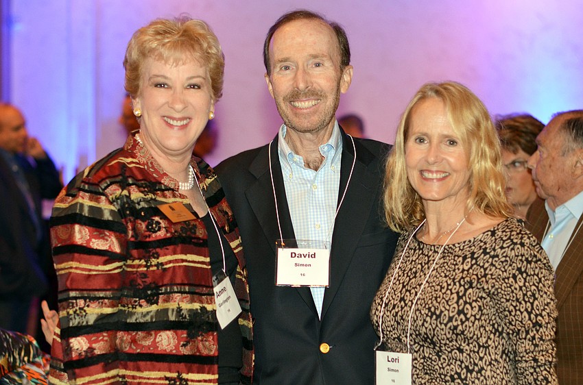 Co-Chair Anne Garlington with David and Lori Simon