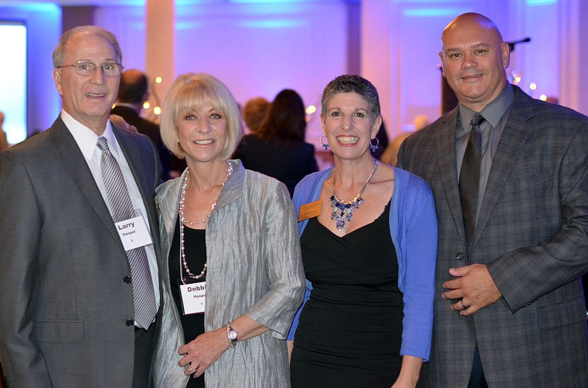 Larry and Debbie Haspel with Heidi Brown and David Lyles