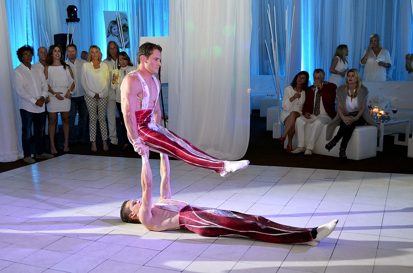 Circus Sarasota performers wowed guests with a strength and balance performance at Wish.