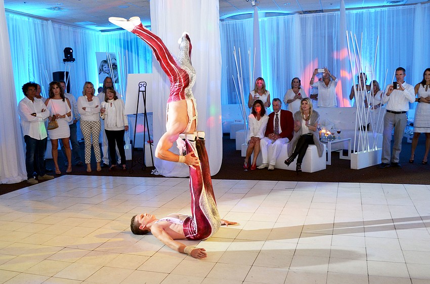 Circus Sarasota performers wowed guests with a strength and balance performance at Wish.