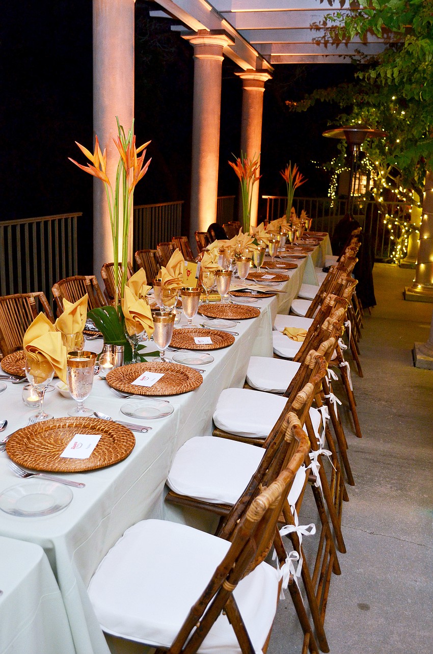A sponsor banquet table was set up under the pergola at Historic Spanish Point for Havana Nights â€“ Party at the Point.