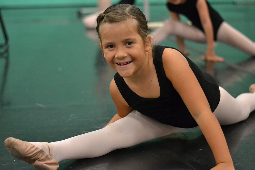 Chiara Diaz works on her leg splits.