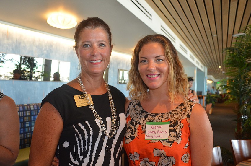 Tammy Halsted, of Florida Vacation Connections, and Robyne Richardson, of Beach Fitness
