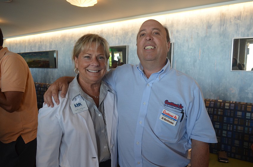 Chamber President Gail Loefgren and Al Benincasa, of sponsor Conditioned Air