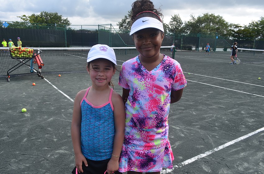 Maria Ostos, 6, and Jada Williams, 9