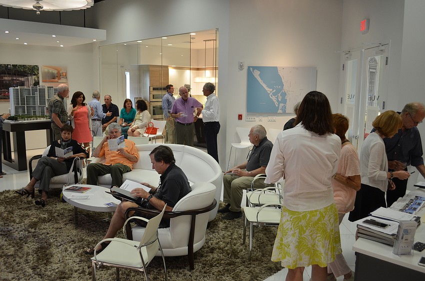 Design lovers and Sarasota Architectural Foundation members gathering in the VUE sales room.