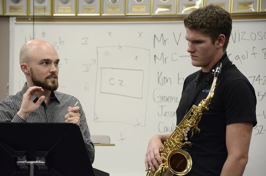 Zachary Pulse, principal oboist of the American Youth Symphony, instructs Jeffrey Thompson, a senior at Pine View School.
