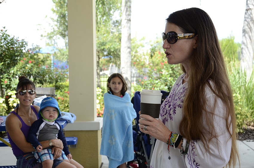 Rabbi Elaine Glickman tells parents about upcoming events.