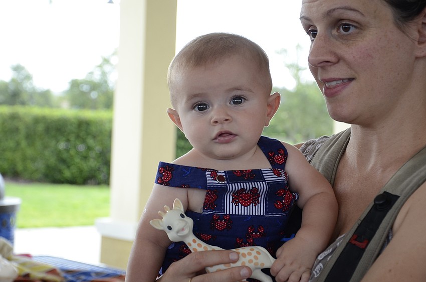 Amy Korenman holds her son, Elliot, who is 5 months old.