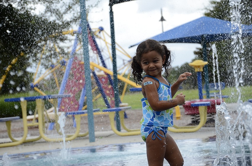 Alexandra Jefferson, 3, plays in the water.