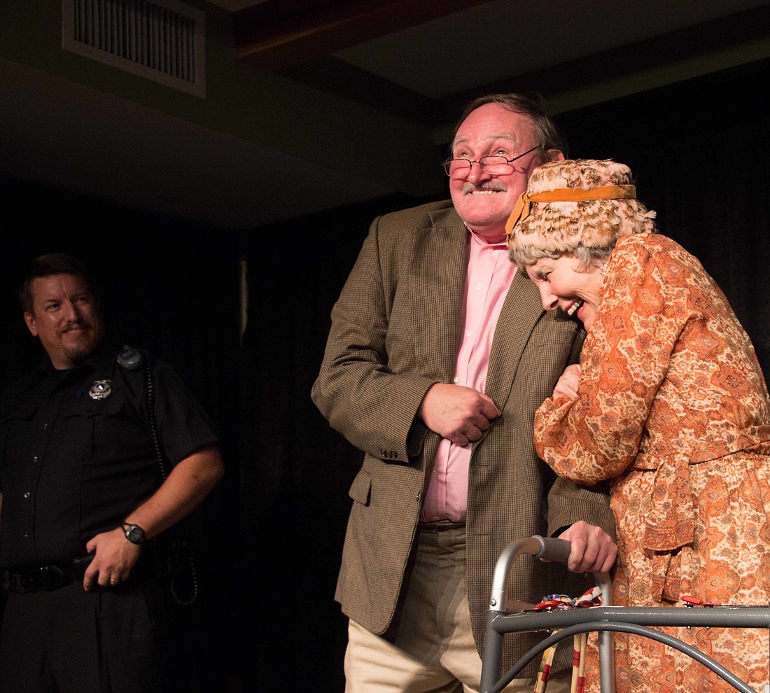 Chuck Conlon and Jenny Aldrich Walker share a tender, happy moment as Dave Downer looks on in "Thanks for the Memories" by Marvin Albert. Photo by Jay Goldman.