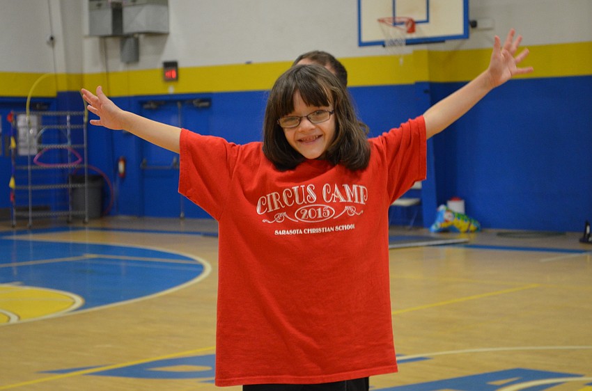 Magan Carroll throws in some personal style on the tightrope.