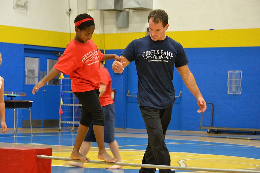 Brianne Gamelin gets some help from Anthony Congnon.