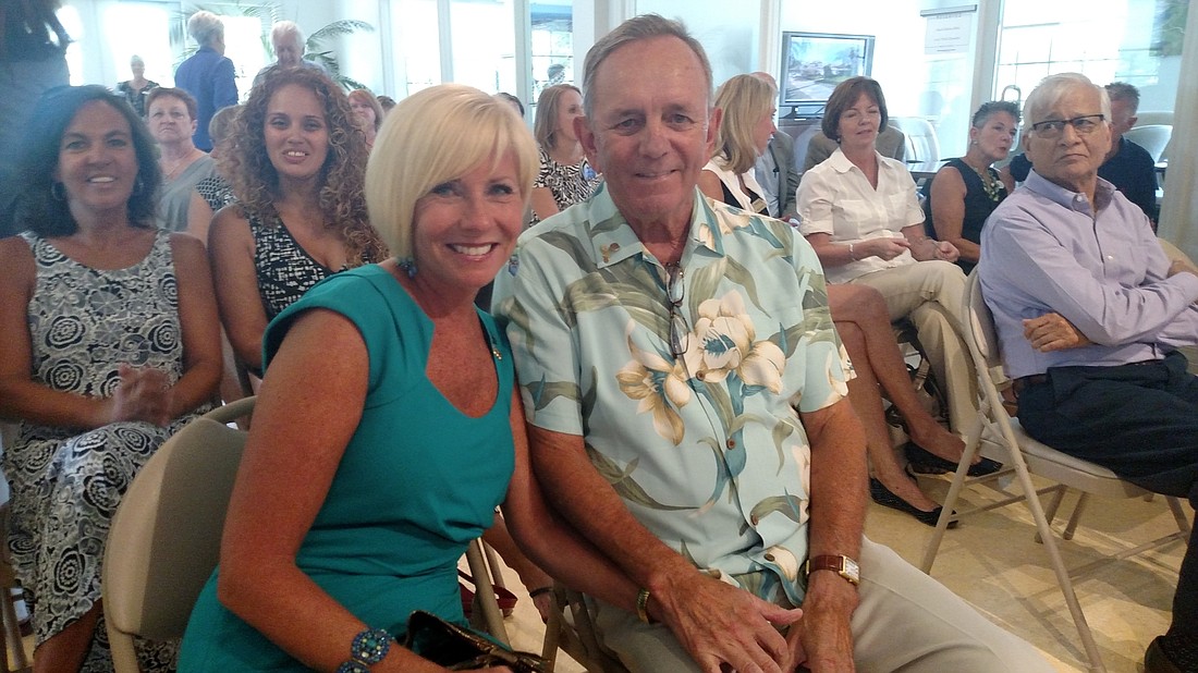 Longboat Key Rotary Club members Bob and Teresa accepted the award July 15.
