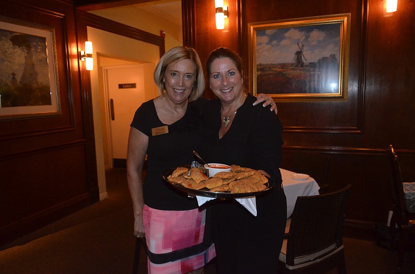 Amore Special Events Manager Susan Leavis and server Barbara Lawson