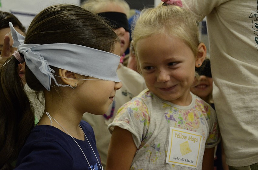 Sofia Llambes and Aubrielle Clarke get ready to try a game.