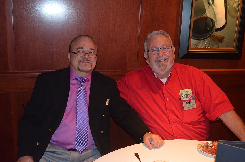 Scott Cessna, of DLC Travel Services, and Jack Dean, of G. Fried FlooringAmerica