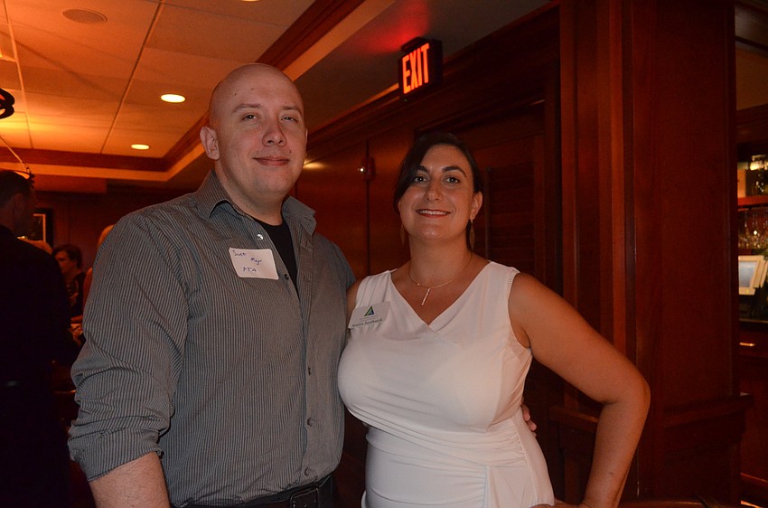 Scott Major, of PTA, and Jessica Southwick, of AAA Payroll Services