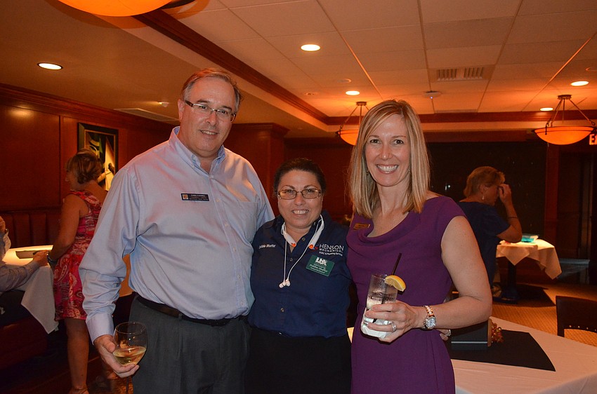 Chris Caswell, of Caswell Legal, Debbie Shaffer, of Henson Mechanical HVAC, and Sherri Mills, of Michael Saunders & Co.