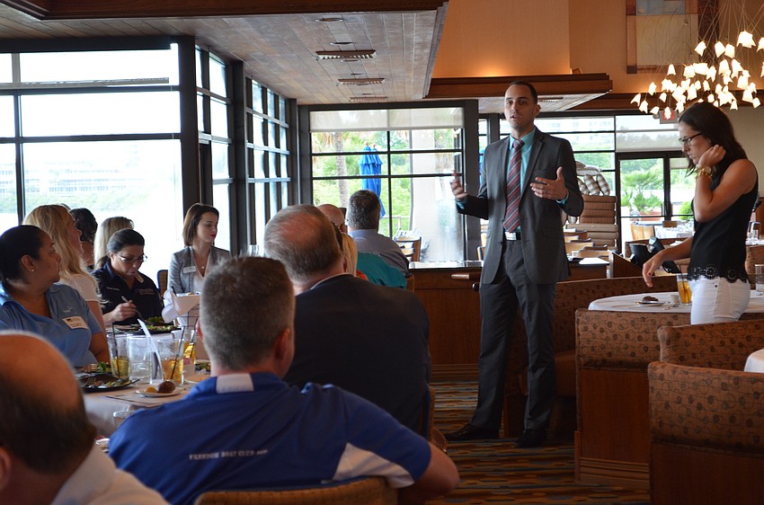 Greater Sarasota Chamber of Commerce Vice President Kevin Cooper welcomes guests and members to the Power Hour Luncheon at Chart House.