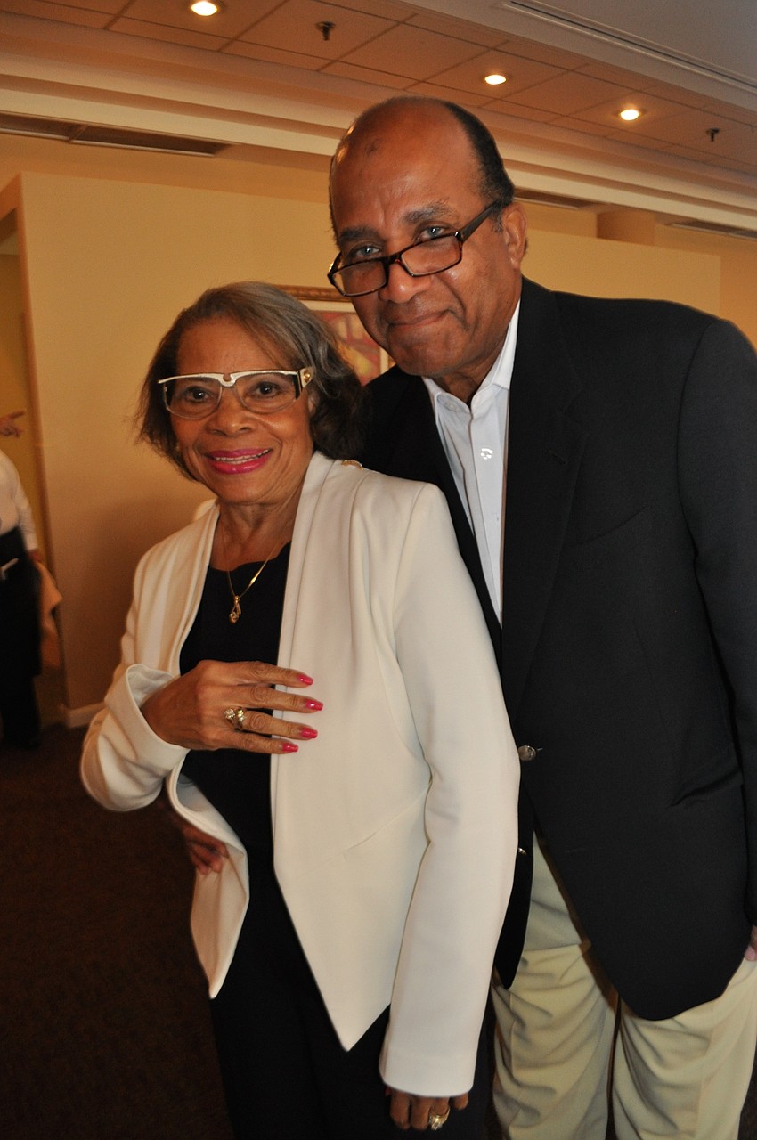 Rosie and Andrew Isaacs head for the buffet line.