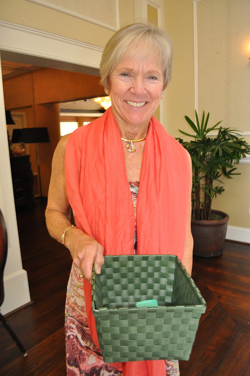 Lindi Moreau sells raffle tickets.