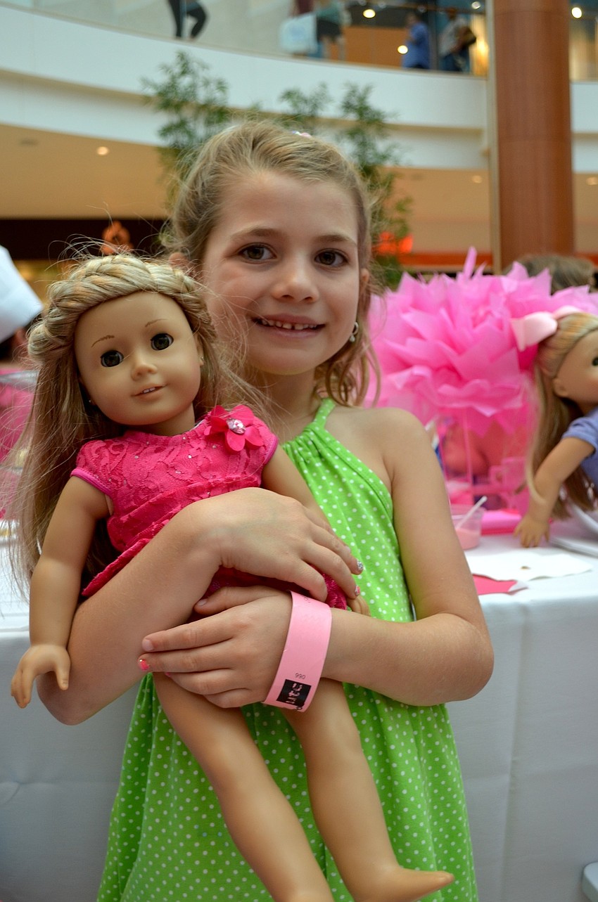 Six-year-old Sophia Ashley shows off her friend, Isabell.