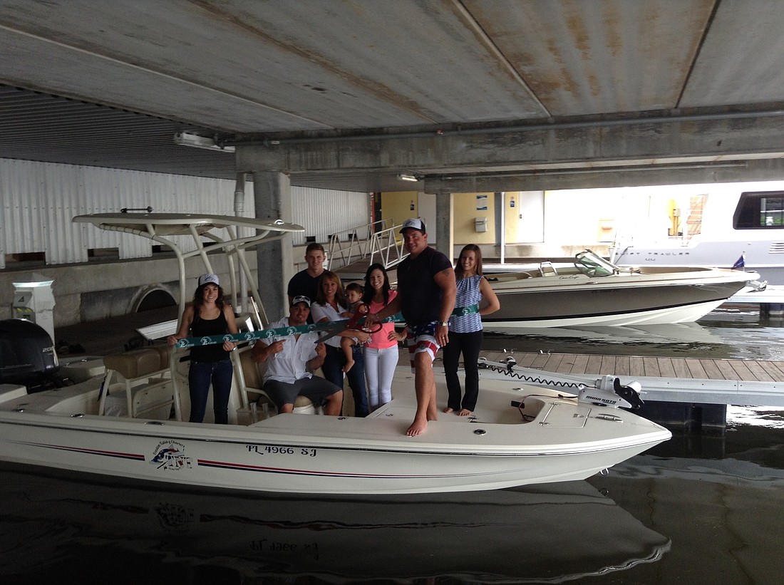 Courtesy photo. Friends and family were aboard for the ribbon cutting ceremony for TNT Freedom Fishing Charters.