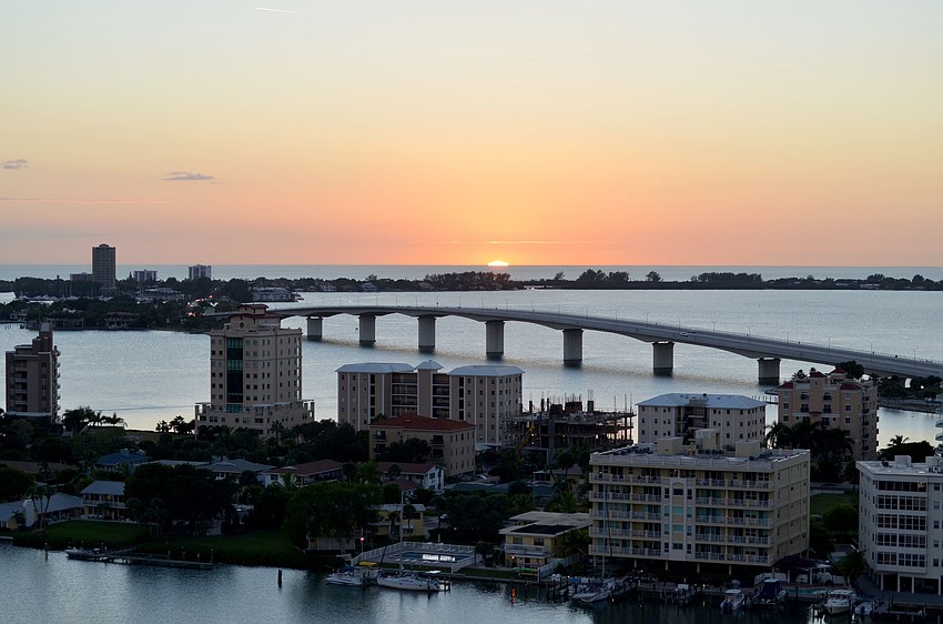Guests enjoyed a stunning sunset on the Biterâ€™s terrace Tuesday, Dec. 2, during the Sarasota Ballet Reception.