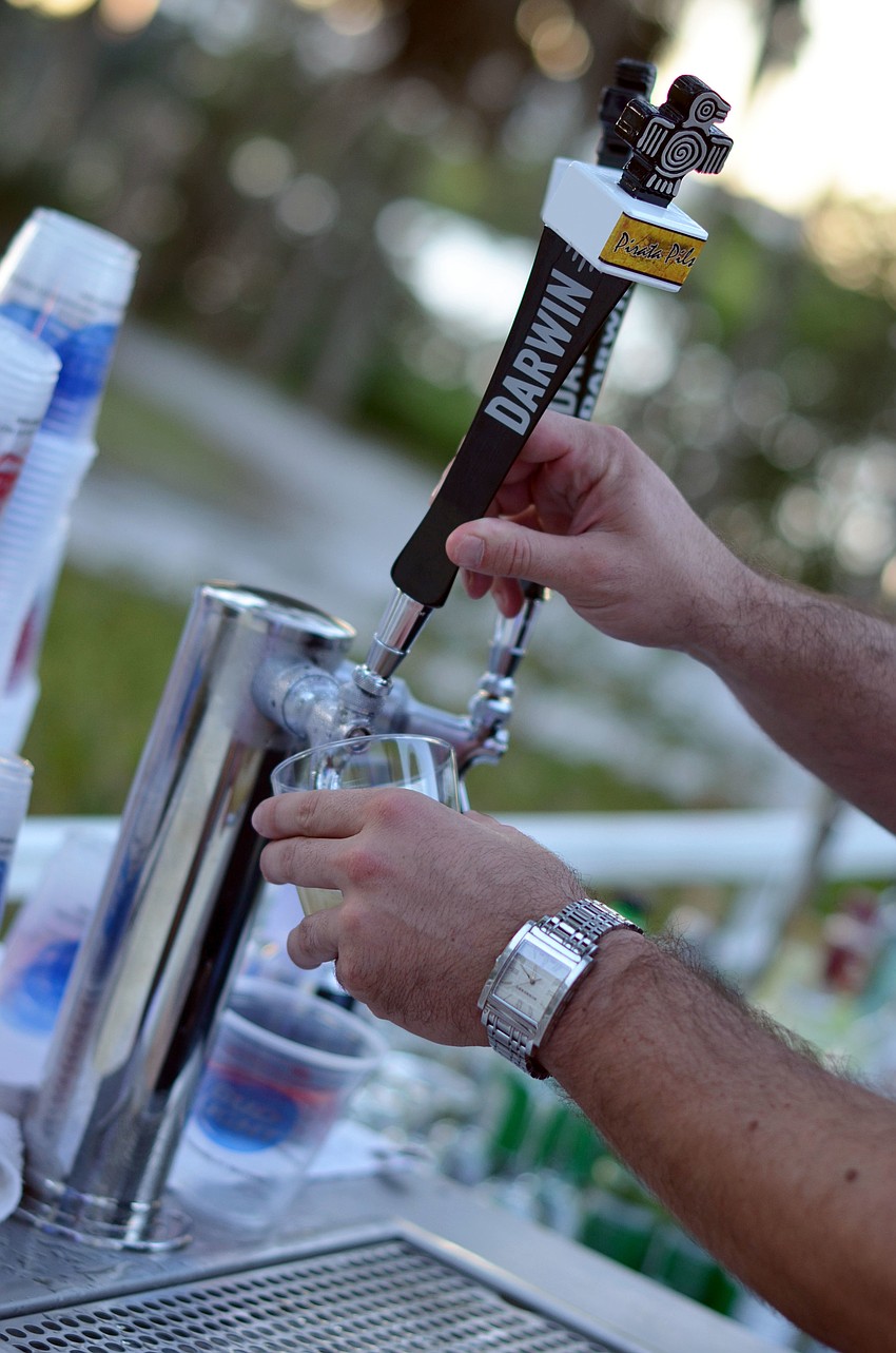 Darwinâ€™s Brewery offered beer selections to guests at Men Whiskey and Watches.