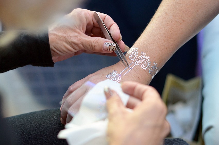 Flash Tattoos were offered to guests at Men Whiskey and Watches