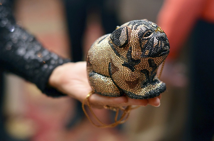 Deb Knowles donned a Judith Leiber pug purse at the 22nd annual Hot Dogs and Cool Cats â€˜Laugh Your Paws Offâ€™ Gala.