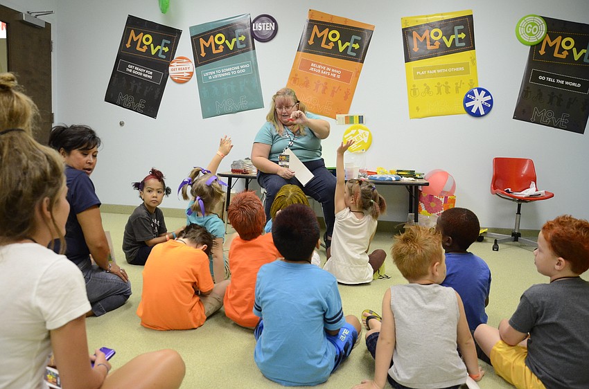 Cindy Schultz starts a game with gummy fish.