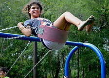 Twelve-year-old Anna Lawrence swings to new heights.