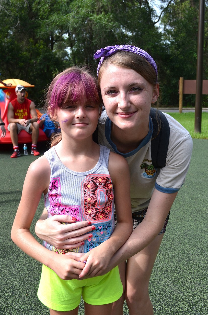 Rebecca Vance and camp volunteer Maya McCarthy are on the purple team.