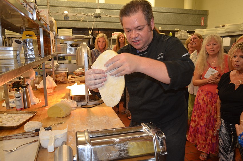 Chef Andrea Bozzolo gives guests a hands-on pasta-making demonstration.