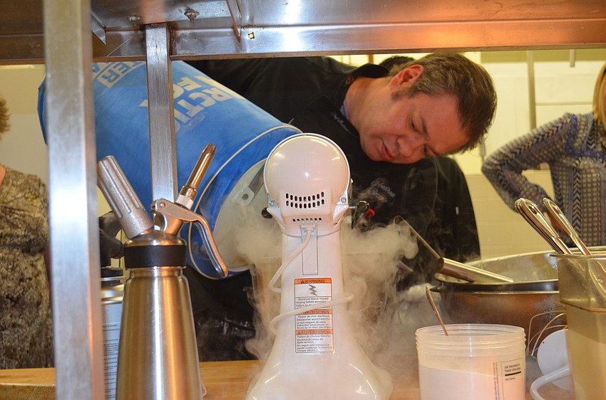 Chef Andrea Bozzolo shows guests how to make liquid nitrogen ice cream.