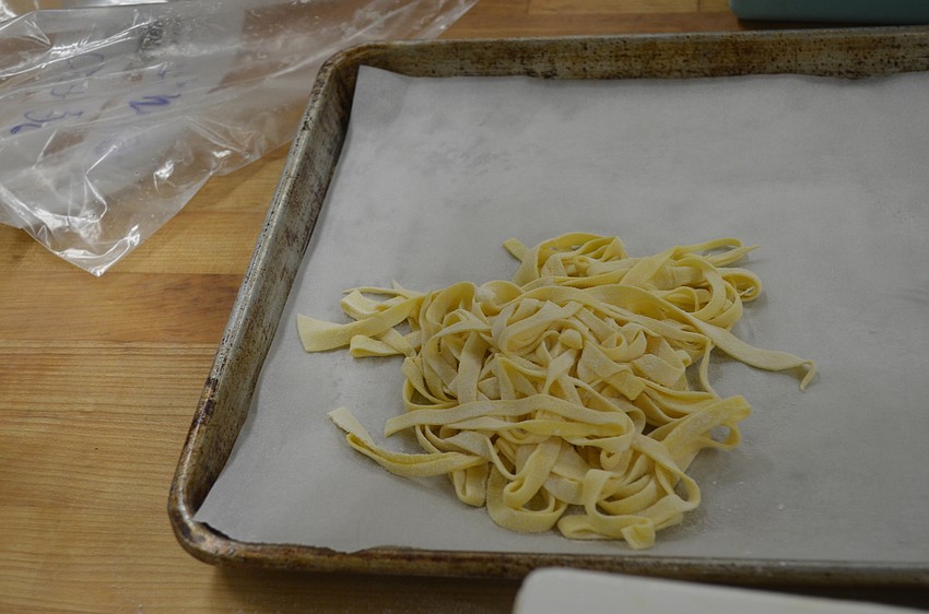 Guests learned how to make fettuccini.