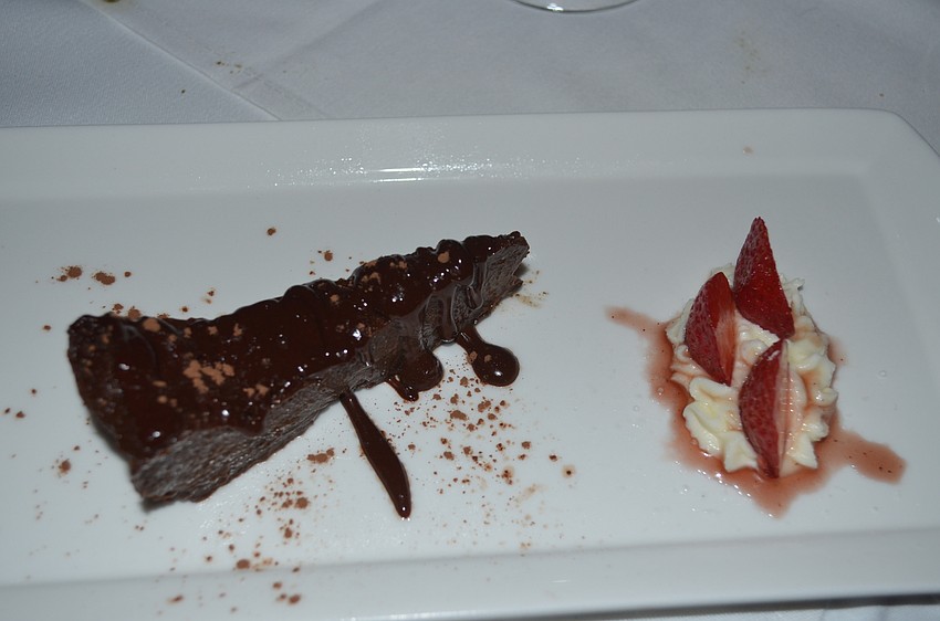 Chocolate ganache cake and strawberries