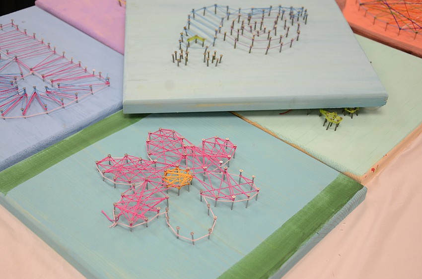 Children made wire and string art for one class.