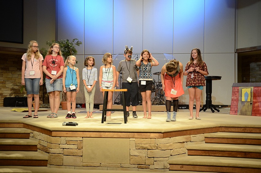 The MAD camp drama class practices their bows at the end of a rehearsal.