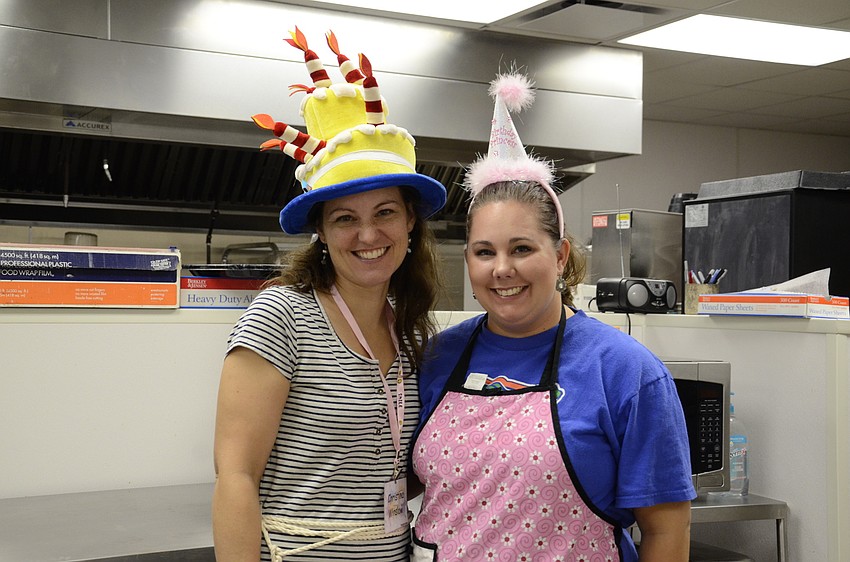 Volunteers Christina Winslow and Kristie Freihaut participated in crazy hat day.
