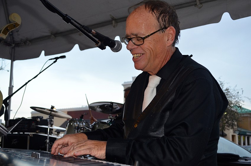 Tim Connelly plays the keyboard as part of the Melanie Massell & Hot Item band.