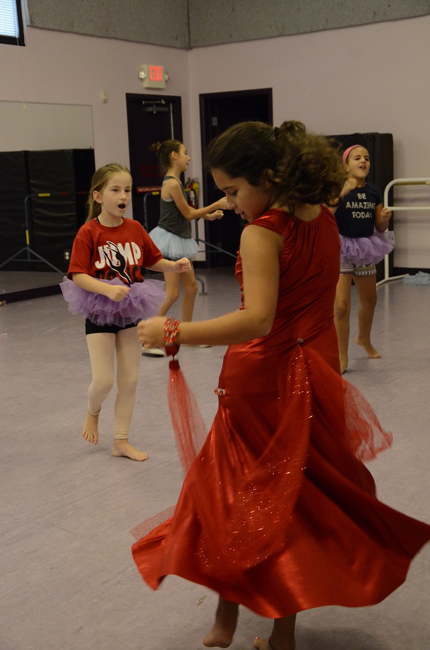 Alyssa Gonzalez, 10, twirls her skirt.