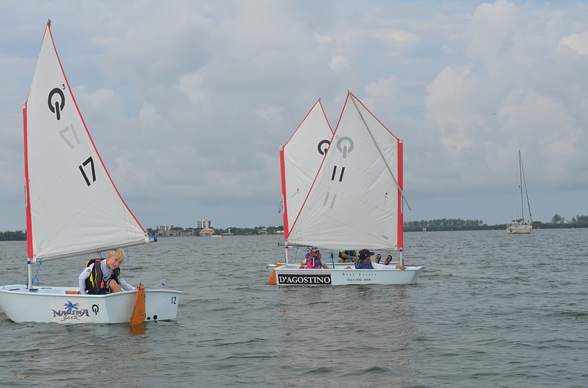 Students learn to control their own sailboats on the last days of the camp.